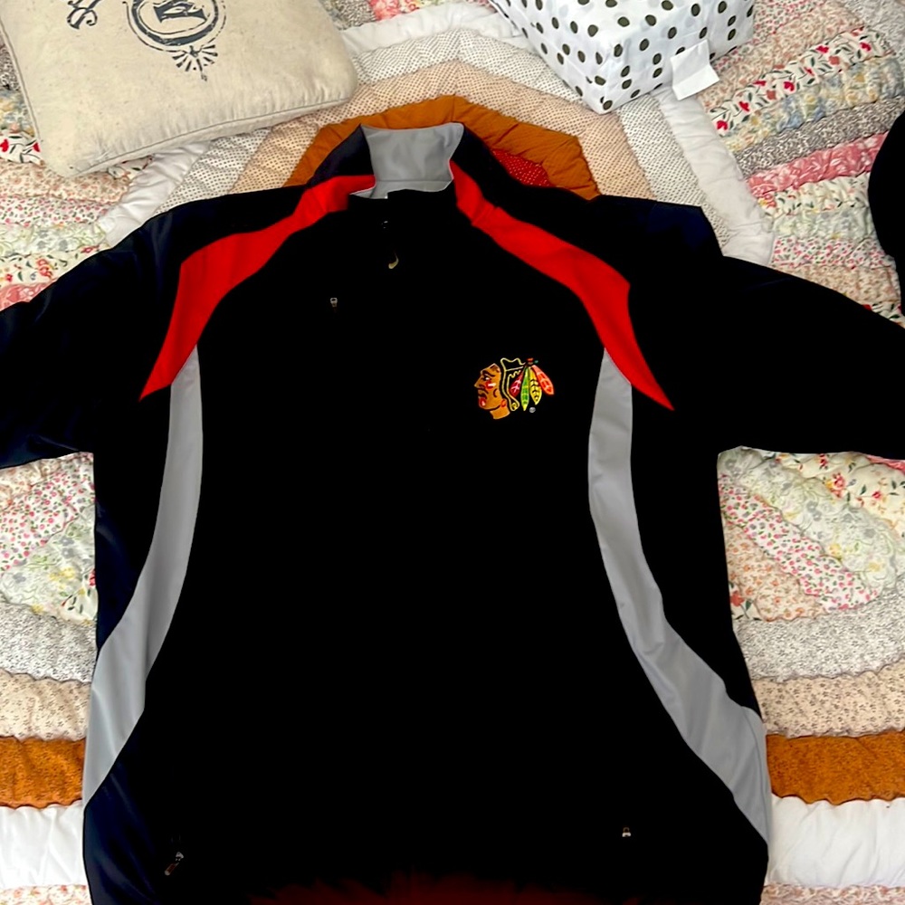 Like new Antigua Chicago blackhawks zip up jacket